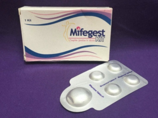 Acheter Misoprostol - Illustration d’une pilule et d’une boîte